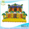 Hansel attractive kids amusement park games inflatable climbing wall with slide المزود