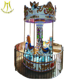 Hansel mechanical horse ride for sale 3 seats mini carousel for sale المزود