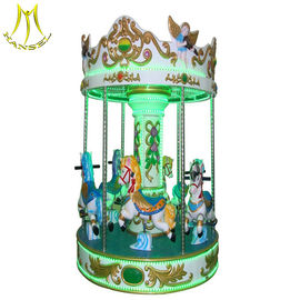 Hansel mechanical horse ride for sale 3 seats mini carousel for sale المزود