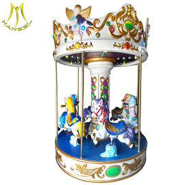 Hansel mechanical horse ride for sale 3 seats mini carousel for sale المزود