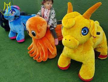Hansel indoor playground unicorn motorized plush animal electric scooter المزود
