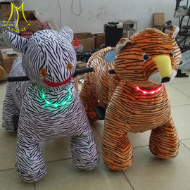 Hansel  shopping mall plush coin operated happy rides on animal plush riding zebra المزود