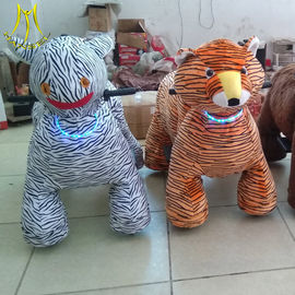 Hansel Guangzhou plush moving toy animal toy horse on 4 wheels for kids المزود