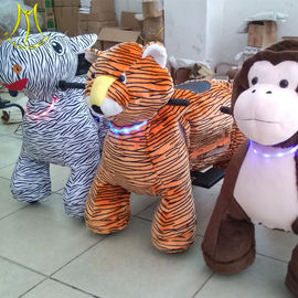 Hansel Guangzhou plush moving toy animal toy horse on 4 wheels for kids المزود